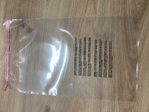 Woreczki foliowe z WARNING 25x33+4  100 szt 